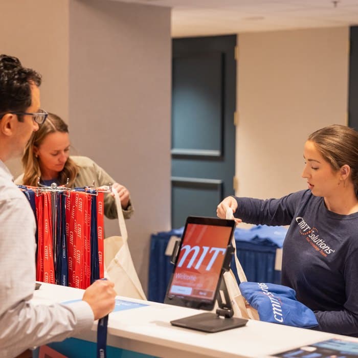 Registration and merchandise desk at ConnectLive