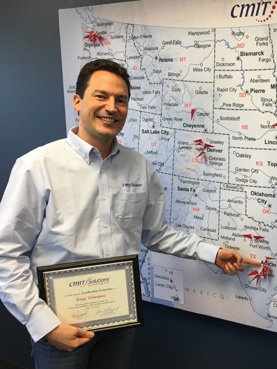 Jorge Velasquez with his CMIT Solutions franchise award